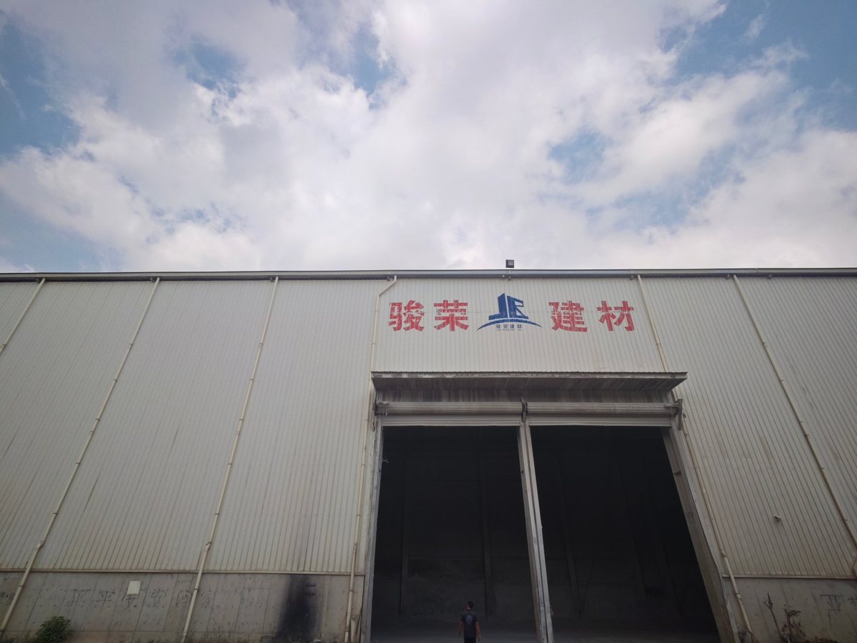 祥荣再生资源厂房外墙全景与场内硬化运输通道